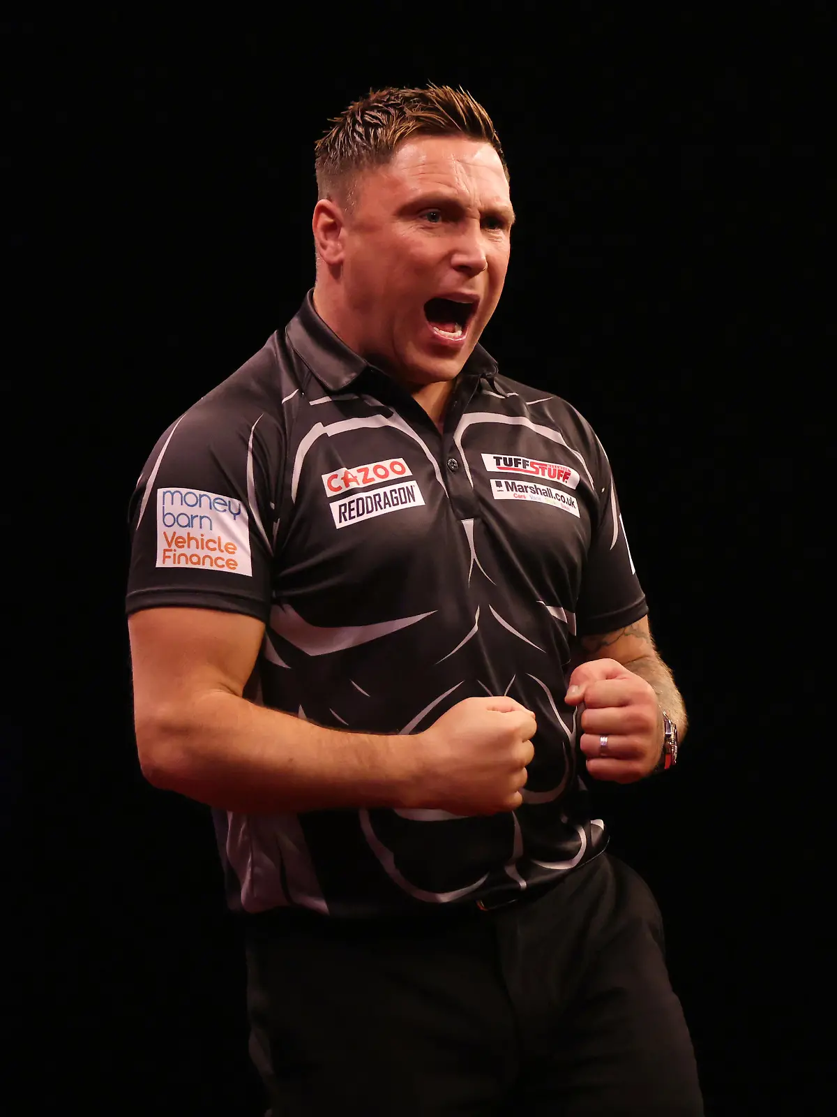 SHEFFIELD, ENGLAND - MAY 12: Gerwyn Price of Wales celebrates during their match against Michael van Gerwen of Netherlands on night 14 of the Cazoo Premier League Darts at Utilita Area Sheffield on May 12, 2022 in Sheffield, England. (Photo by George Wood/Getty Images)