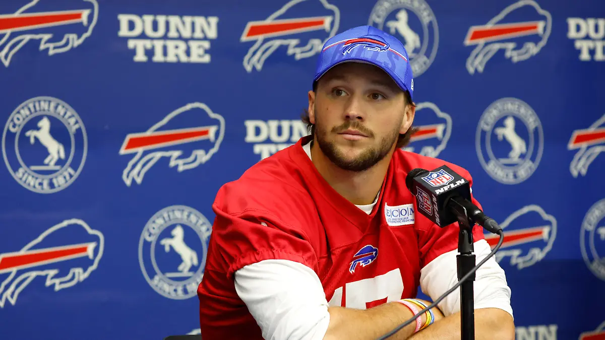 Buffalo Bills quarterback Josh Allen (17) addresses the media following an NFL football Mandatory Minicamp practice in Orchard Park, N.Y., Tuesday June 13, 2023. (AP Photo/Jeffrey T. Barnes)