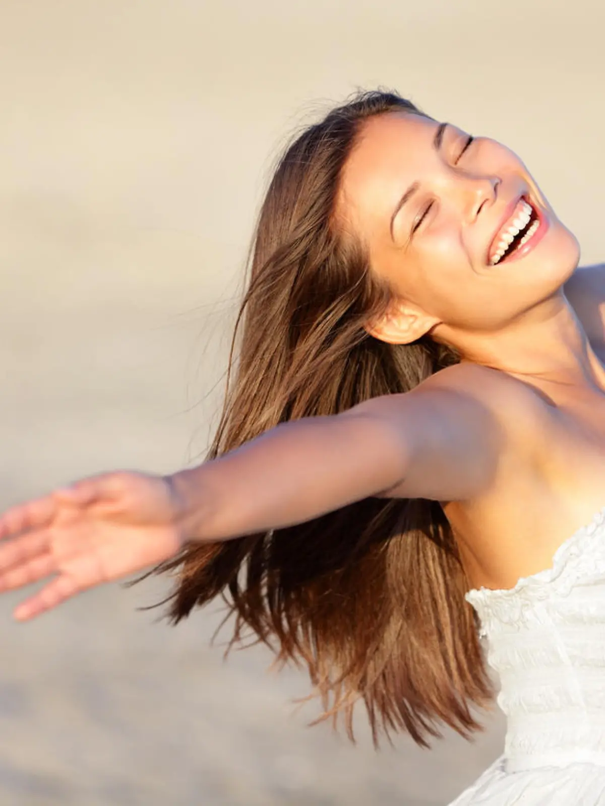 Happy vacation woman on beach summer holiday in cheerful bliss enjoying the sunshine. Beautiful ethnic girl in her 20s..Similars: