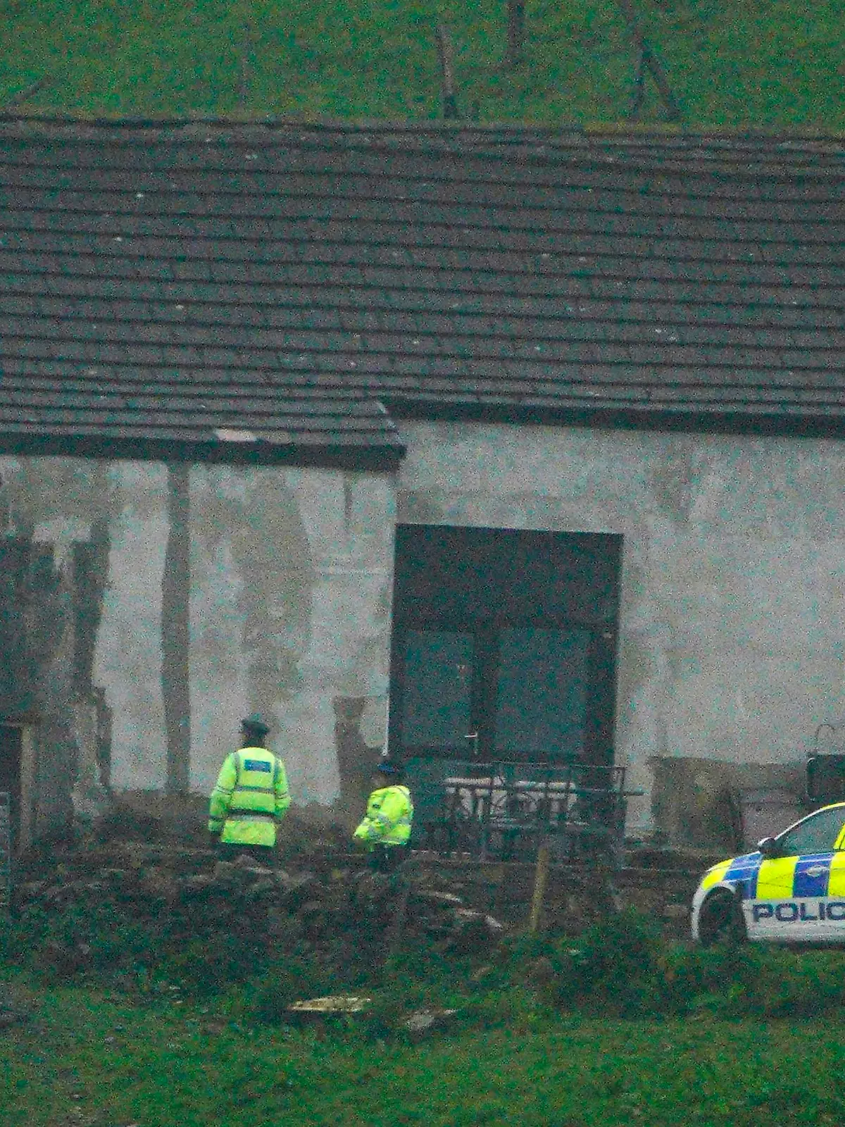 Milnrow dog attack. Police at a building in Milnrow, Rochdale after a three-year-old boy died after a suspected dog attack. Picture date: Monday May 16, 2022. Officers were called at about 1.15pm on Sunday by the North West Ambulance Service after reports a child had been injured at Carr Lane. Photo credit should read: Peter Byrne/PA Wire URN:66919099