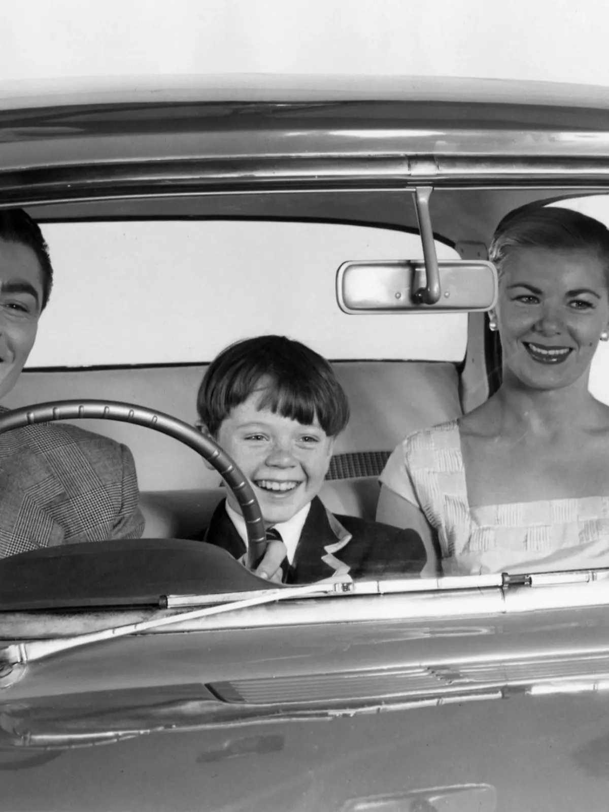 1957 Vauxhall Victor with family together in front seat. (National Motor Museum/Heritage Images)