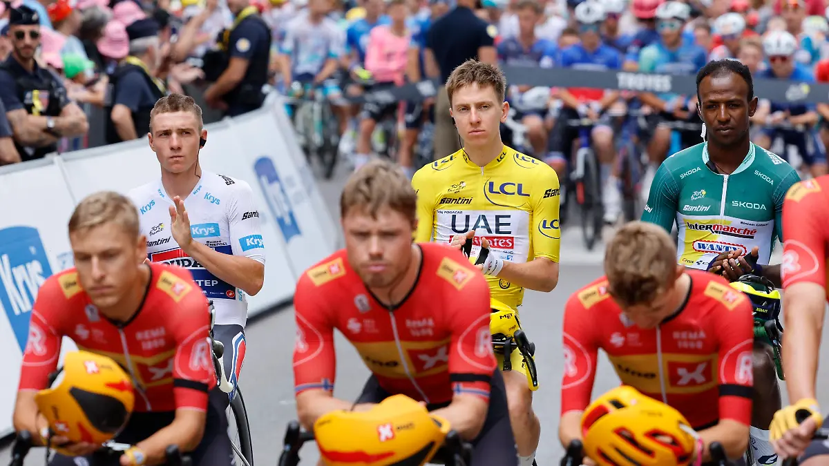 Tour de France 2024 - Stage 09 TROYES, FRANCE - JULY 07 : Following the passing away of the rider Andre Drege yesterday, the Uno-X Mobility riders and Evenepoel Remco BEL of Soudal - Quick Step, Pogacar Tadej SVN of UAE Team Emirates, Girmay Biniam ERI of Intermarche - Wanty will be called this morning on the start line 5 minutes before the start of the stage in order to pay tribute to him during stage 9 of the 111th edition of the Tour de France 2024 cycling race, a stage of 199 kms with start and finish in Troyes on July 07, 2024 in Troyes, France, 07/07/2024 Troyes France
