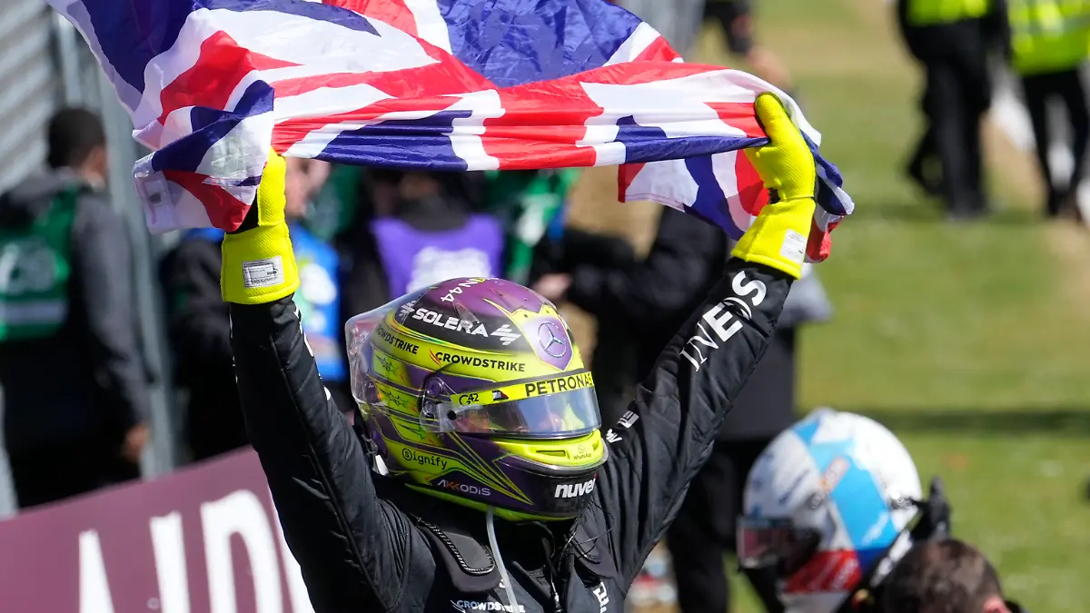 Mercedes driver Lewis Hamilton of Britain celebrates after winning the British Formula One Grand Prix race at the Silverstone racetrack, Silverstone, England, Sunday, July 7, 2024.