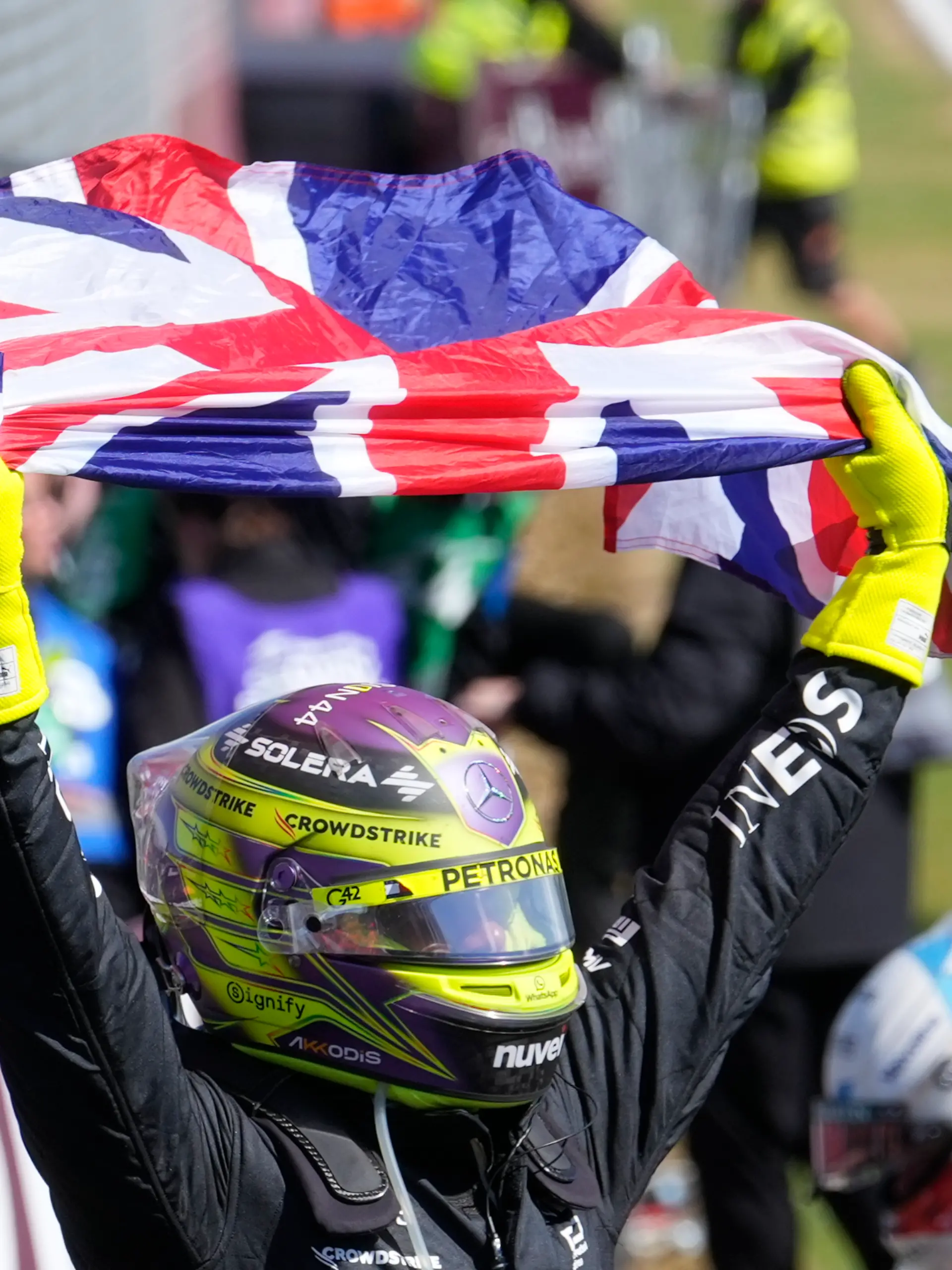 Mercedes driver Lewis Hamilton of Britain celebrates after winning the British Formula One Grand Prix race at the Silverstone racetrack, Silverstone, England, Sunday, July 7, 2024.