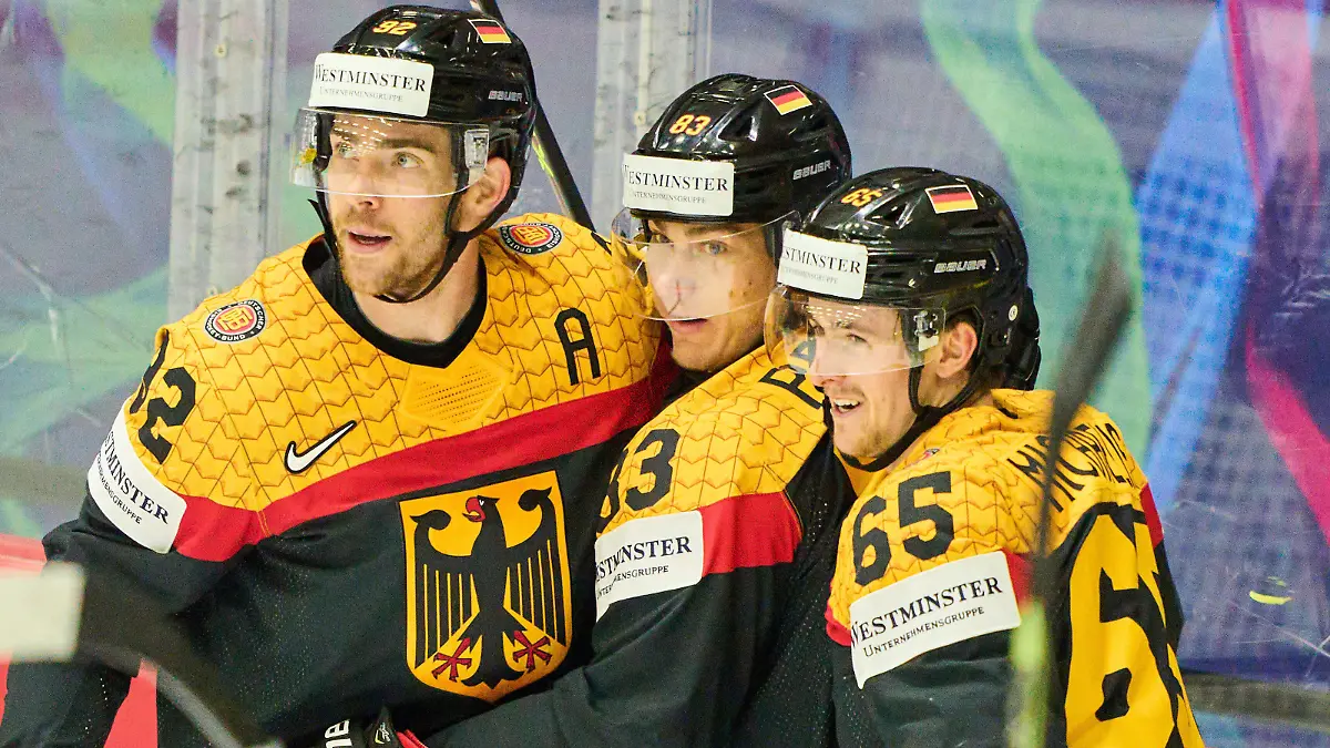 Leonard Leo Pföderl Nr. 83 of Germany scores, shoots goal , Tor, Treffer, Torschuss, 3-2, celebrates his goal, happy, laugh, celebration, Marcel Noebels Nr. 92 of Germany Marc MICHAELIS Nr.65 of Germany in the match GERMANY - FRANCE of the IIHF Ice hockey, Eishockey World Championship, WM, Weltmeisterschaft Group B in Helsinki, Finland, May 16, 2022, Season 2021/2022 