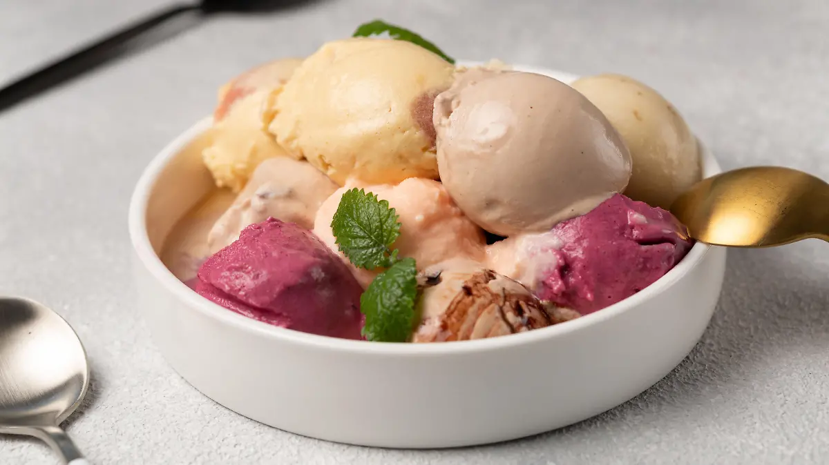Assorted ice cream balls in one large plate, serving for company