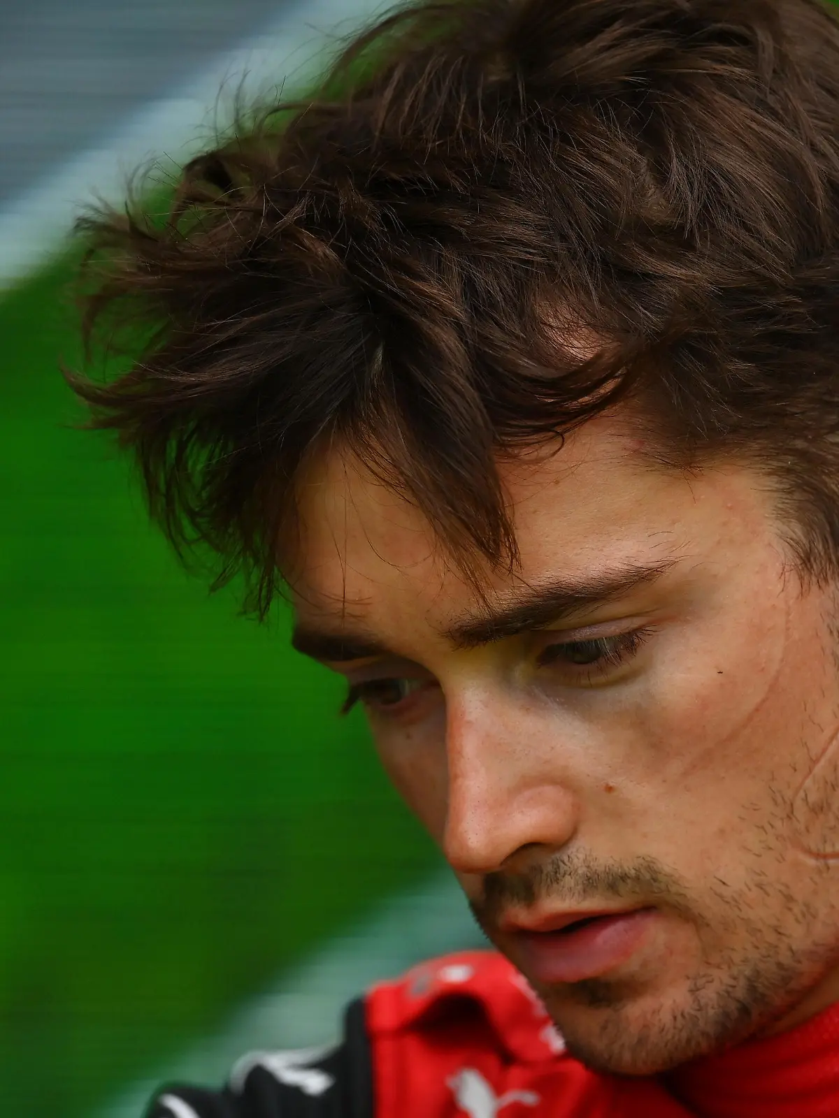 IMOLA, ITALY - APRIL 24: 6th placed Charles Leclerc of Monaco and Ferrari looks dejected in parc ferme after spinning out from third position with 10 laps remaining during the F1 Grand Prix of Emilia Romagna at Autodromo Enzo e Dino Ferrari on April 24, 2022 in Imola, Italy. (Photo by Dan Mullan/Getty Images)