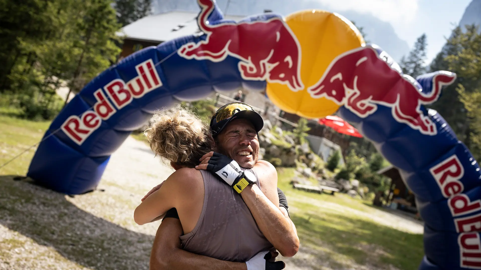 Michael Strasser finishes his project 771 at Triglav in Slovenia, on July 9 2024, emotionally hugging his wife