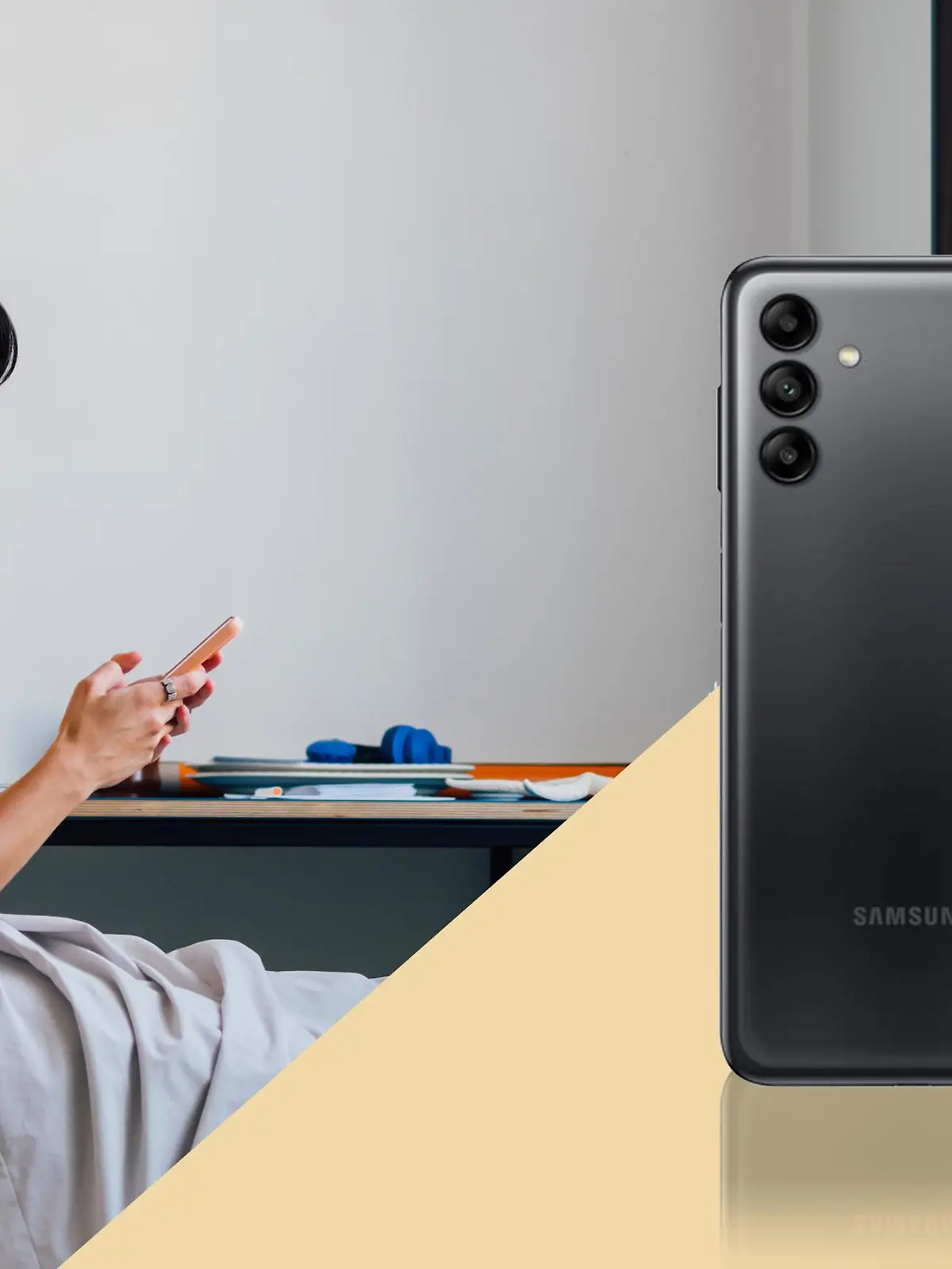 Eine Frau, die das Samsung Galaxy A04s hält.
