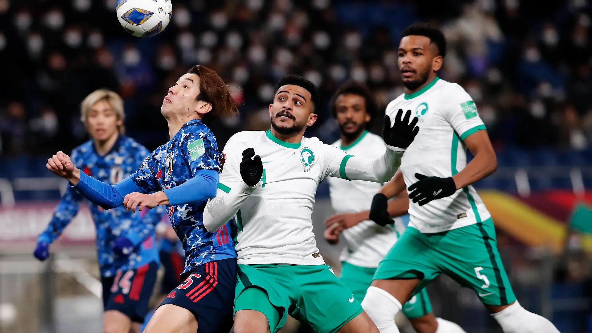 February 1, 2022, Saitama, Japan: Yuya Osako 15 of Japan and Abdulelah Alamri 4 of Saudi Arabia compete for the ball during an AFC Asian Qualifiers Road to Qatar Japan vs Saudi Arabia at Saitama Stadium 2002 in Japan. Japan leads Saudi Arabia 1 - 0 at halftime. Saitama Japan - ZUMAm191 20220201_zap_m191_001 Copyright: xRodrigoxReyesxMarinx