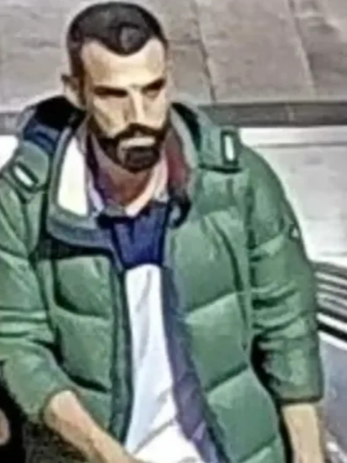 Ein Mann auf einem Überwachungsbild.