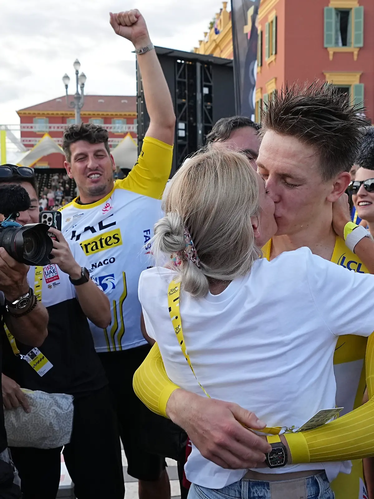 Tour de France winner Slovenia’s Tadej Pogacar kisses his partner Urska Zigart after the twenty-first stage of the Tour de France cycling race, an individual time trial over 33.7 kilometers (20.9 miles) with start in Monaco and finish in Nice, France, Sunday, July 21, 2024.