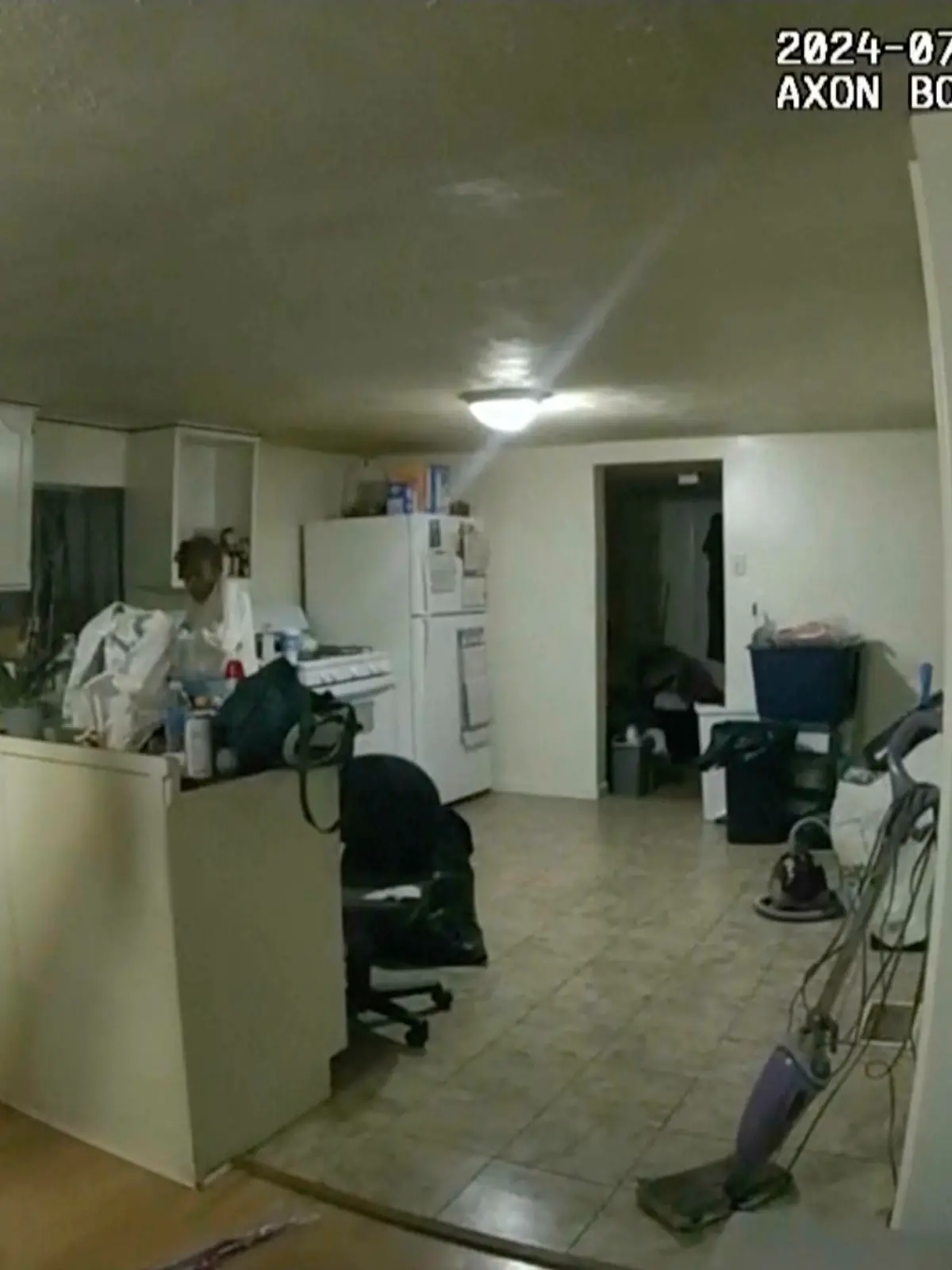 In this image taken from body camera video released by Illinois State Police on Monday, July 22, 2024, former Sangamon County Sheriff’s Deputy Sean Grayson, left, points his gun at Sonya Massey, who called 911 for help, before shooting and killing her inside her home in Springfield, Ill., July 6, 2024. (Illinois State Police via AP)