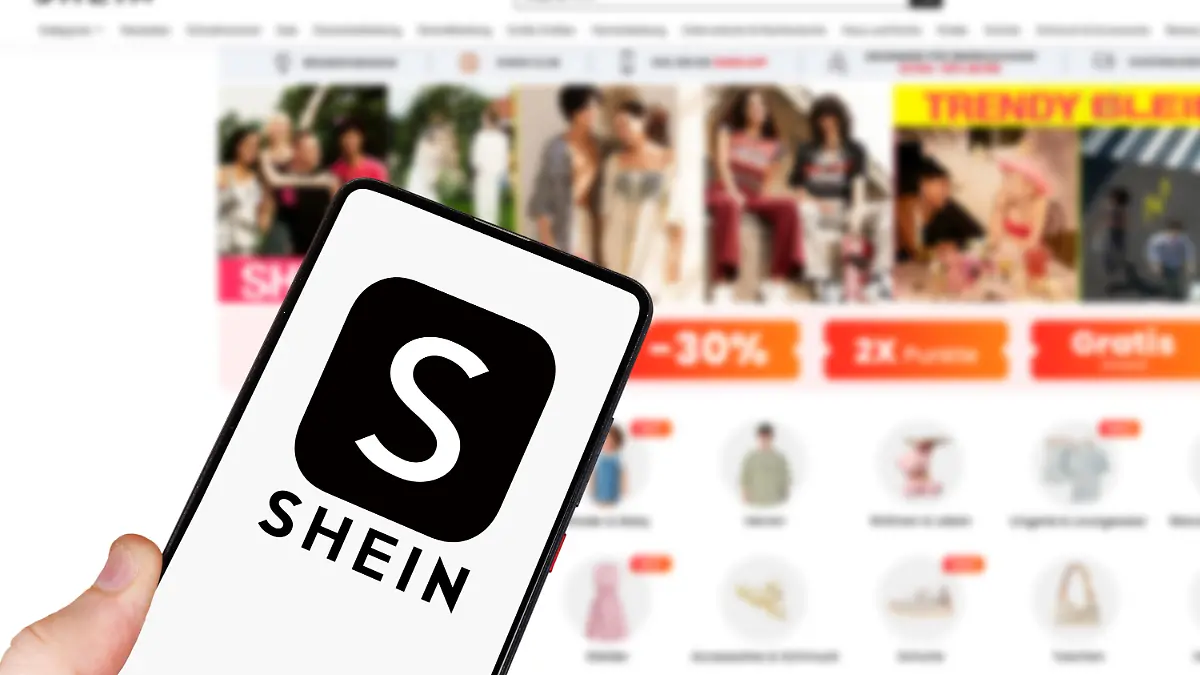 Das Shein Logo auf einem Handy und Computer