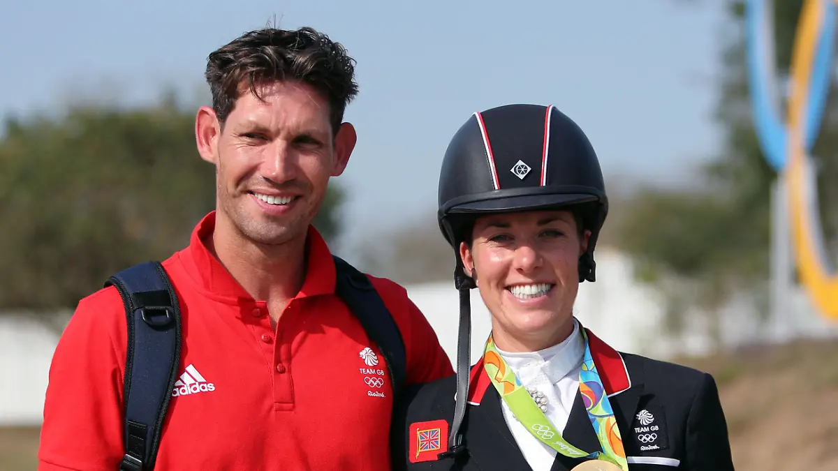 Rio Olympics 2016. File photo dated 15/8/2016 of Great Britain’s Charlotte Dujardin with her fiancee Dean Wyatt Golding (left) following her gold medal in the dressage individual grand prix freestyle on the tenth day of the Rio Olympics Games, Brazil.