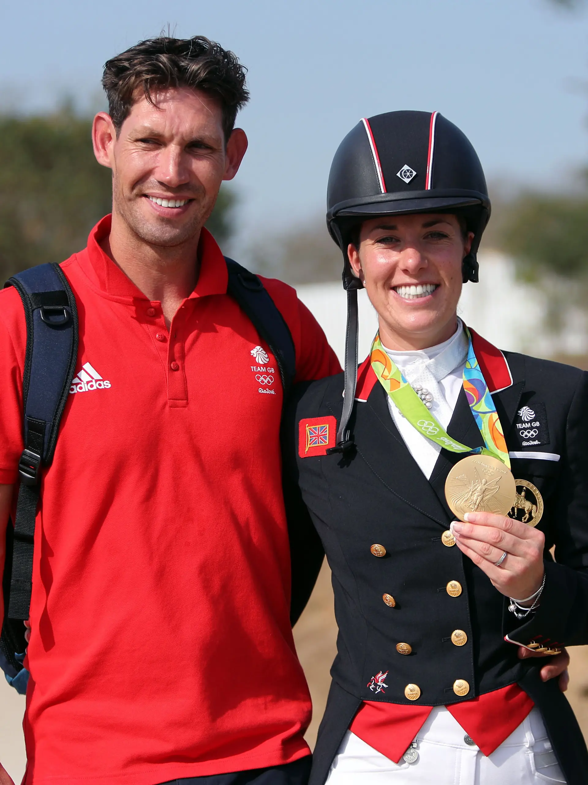 Rio Olympics 2016. File photo dated 15/8/2016 of Great Britain’s Charlotte Dujardin with her fiancee Dean Wyatt Golding (left) following her gold medal in the dressage individual grand prix freestyle on the tenth day of the Rio Olympics Games, Brazil.