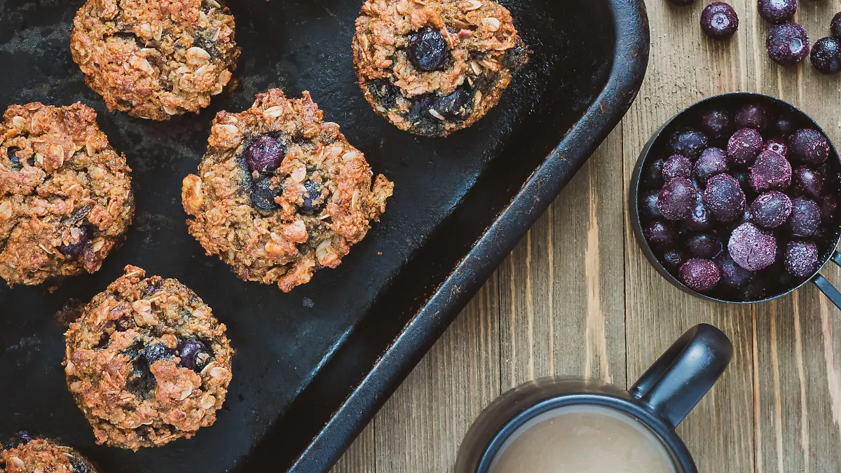 Muffins made with grated beet roots and frozen blueberries.