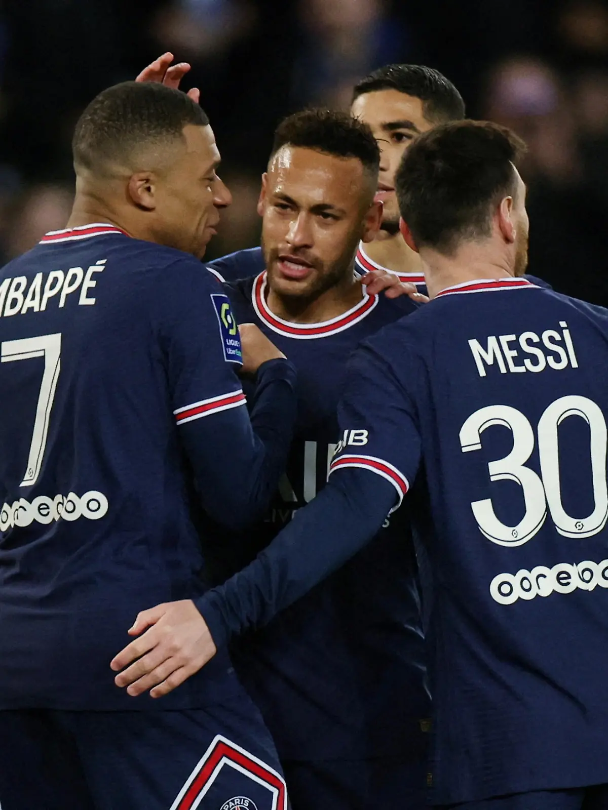 FILE PHOTO: Soccer Football - Ligue 1 - Paris St Germain v Lorient - Parc des Princes, Paris, France - April 3, 2022 Paris St Germain's Neymar celebrates scoring their first goal with Kylian Mbappe and Lionel Messi REUTERS/Sarah Meyssonnier/File Photo