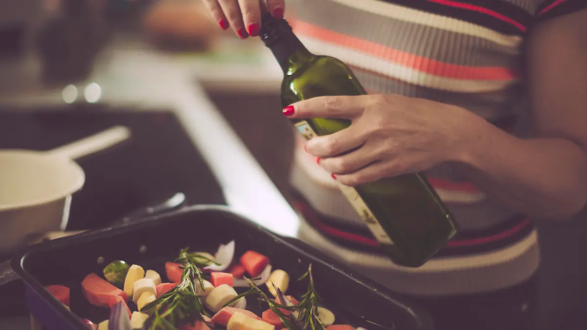 Woman, preparing, food, olive oil, bottle, kitchen, vegetables, colorful, stove, healthy lifestyle, healthy eating, lunch, dinner