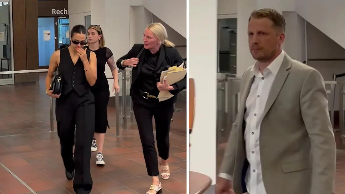 Szene im Video - hier verlassen Amira und Olli das Gericht