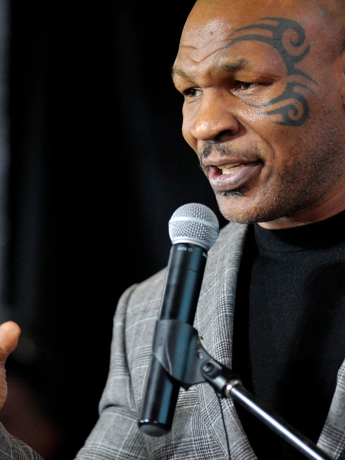 FILE - Former boxer Mike Tyson holds a news conference on Feb. 21, 2014, in Bethlehem, Pa. Authorities will not file criminal charges against former heavyweight champ Mike Tyson after he was recorded on video punching a fellow first-class passenger aboard a plane at San Francisco International Airport last month, prosecutors announced Tuesday, May 10, 2022. (Stephen Flood/The Express-Times via AP, File)