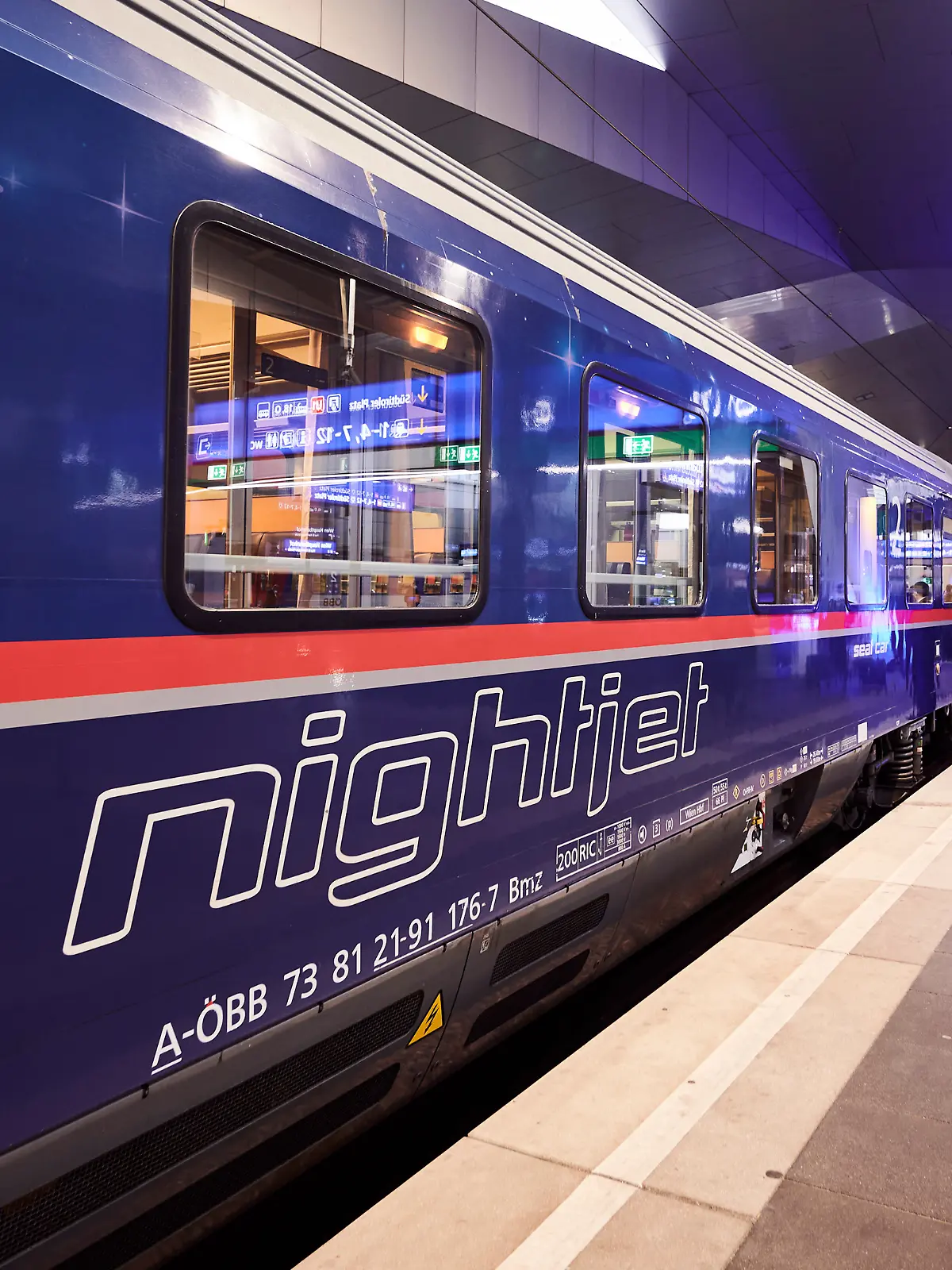 This image released by ÖBB shows a Nightjet sleeper train at a station in Vienna, Austria. A growing number of climate-conscious Europeans are giving up flying in favor of long-haul trains. (Marek Knopp/ÖBB via AP)