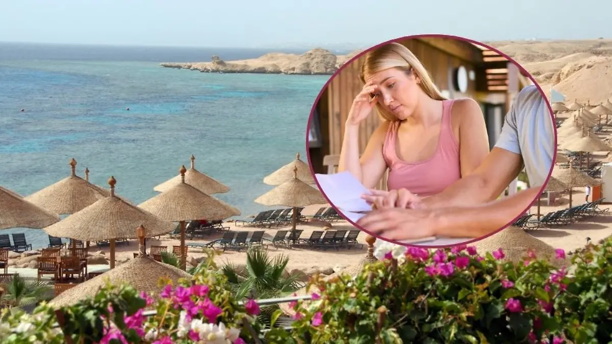 paar,besorgt,schulden,Bildverwendung nur mit Urhebervermerk: Monkey Business 2/Shotshop/picture alliance. Keine Exlusivverkäufe möglich. / Exotischen Strand mit Sonnenschirmen und bougainvillea, Sharm-el-Sheikh, Ägypten