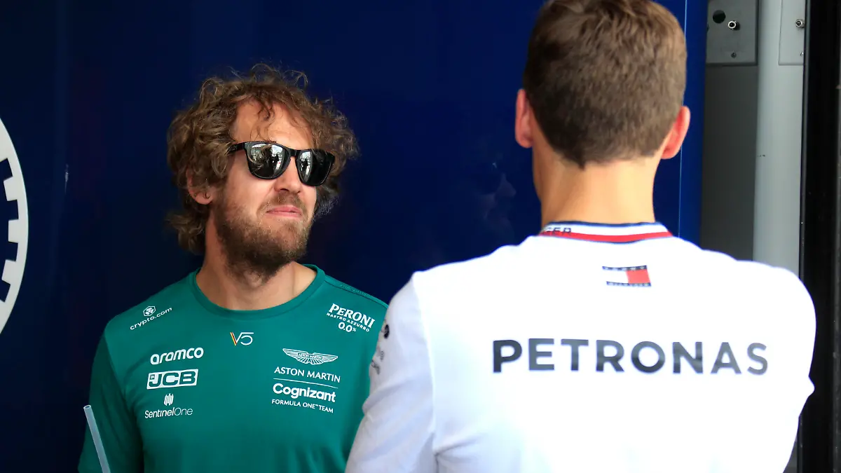 MIAMI GARDENS, FL - MAY 08: Aston Martin Aramco Cognizant driver Sebastian Vettel 5 of Germany talks Mercedes-AMG Petronas driver George Russell 63 of Great Britain during the parade of drivers prior to the Formula 1 CRYPTO.COM Miami Grand Prix on May 8, 2022 at Miami International Autodrome in Miami Gardens, FL.Photo by Jeff Robinson/Icon Sportswire AUTO: MAY 08 F1 Crypto.com Miami Grand Prix Icon22050812171