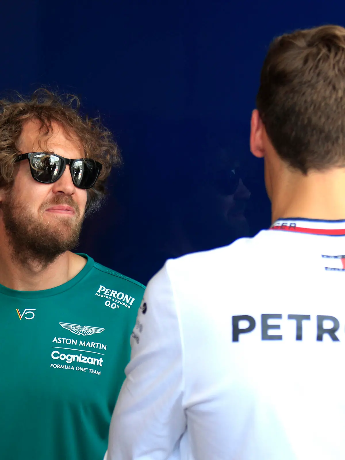 MIAMI GARDENS, FL - MAY 08: Aston Martin Aramco Cognizant driver Sebastian Vettel 5 of Germany talks Mercedes-AMG Petronas driver George Russell 63 of Great Britain during the parade of drivers prior to the Formula 1 CRYPTO.COM Miami Grand Prix on May 8, 2022 at Miami International Autodrome in Miami Gardens, FL.Photo by Jeff Robinson/Icon Sportswire AUTO: MAY 08 F1 Crypto.com Miami Grand Prix Icon22050812171 