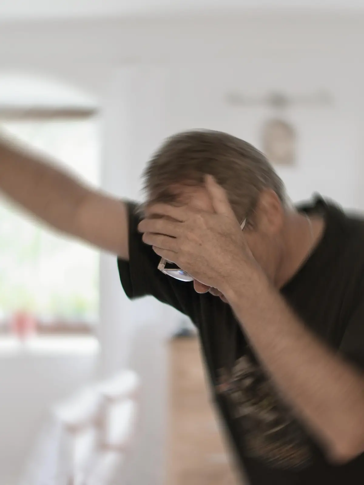 Man suffering from vertigo or dizziness or other health problem of brain or inner ear.