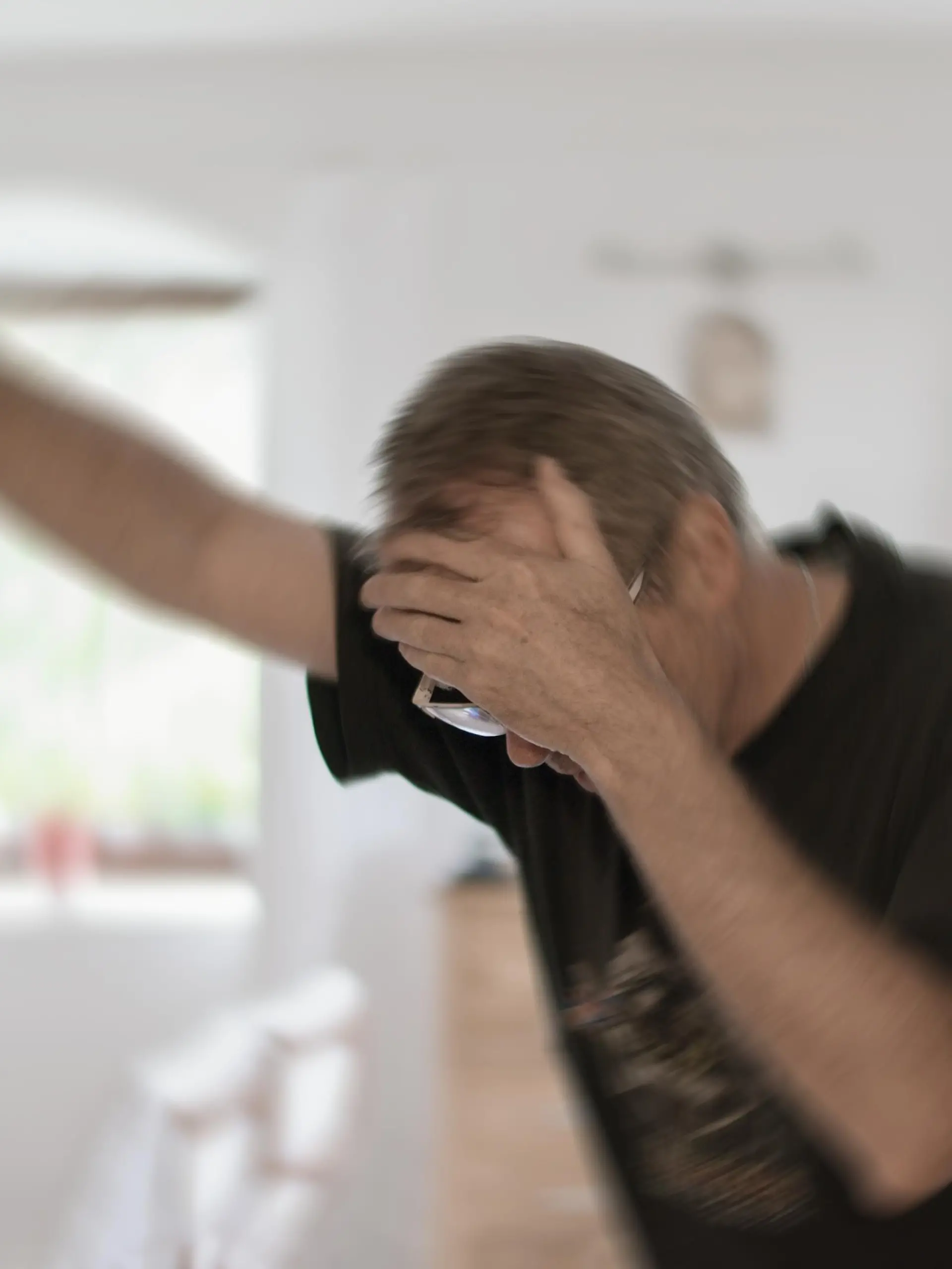 Man suffering from vertigo or dizziness or other health problem of brain or inner ear.