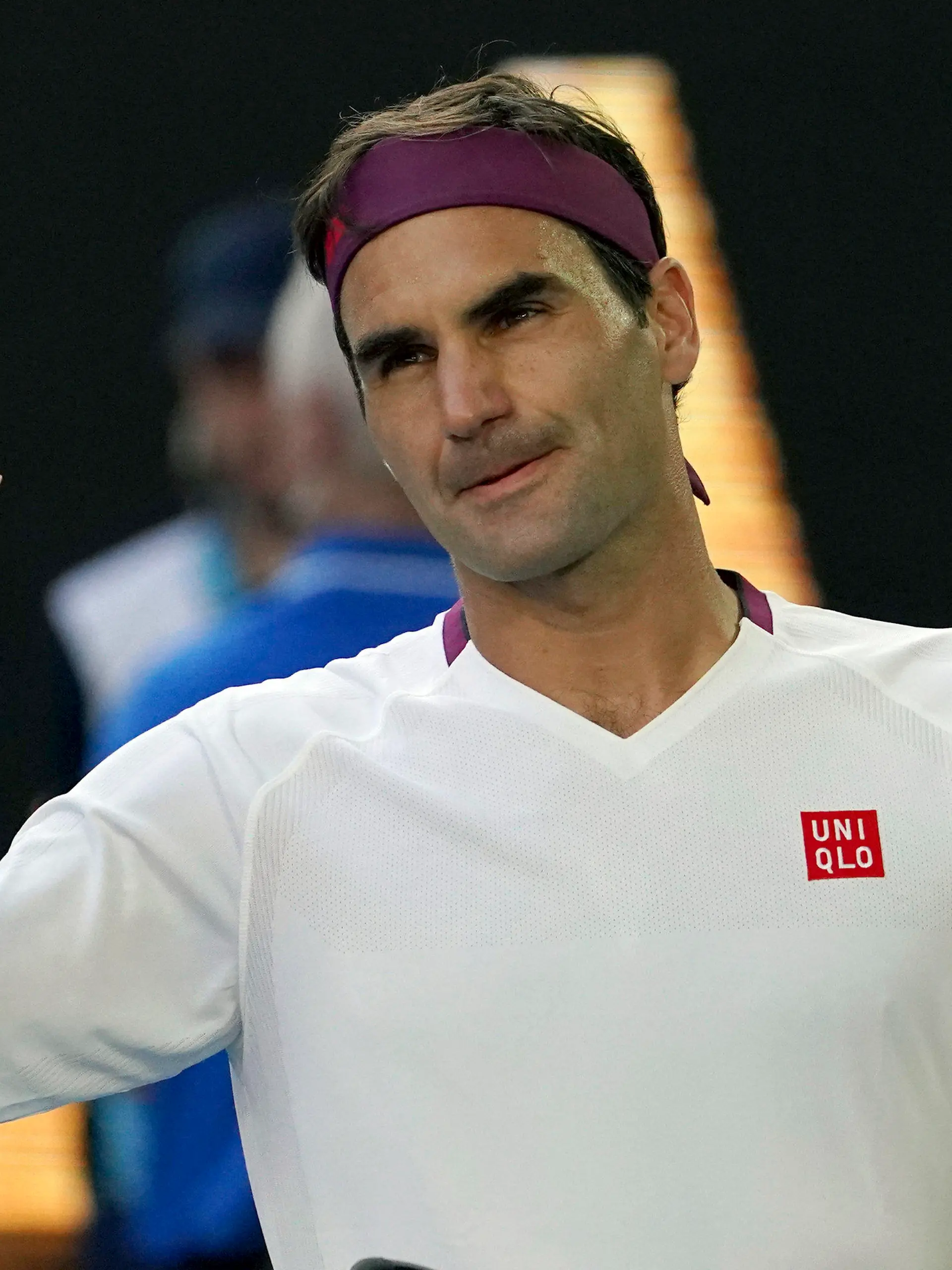 FILE- In this Jan. 28, 2020, file photo, Switzerland's Roger Federer waves after defeating Tennys Sandgren, of the United States, in their quarterfinal match at the Australian Open tennis championship in Melbourne, Australia. Federer is back on tour after more than a year away. (AP Photo/Lee Jin-man, File)