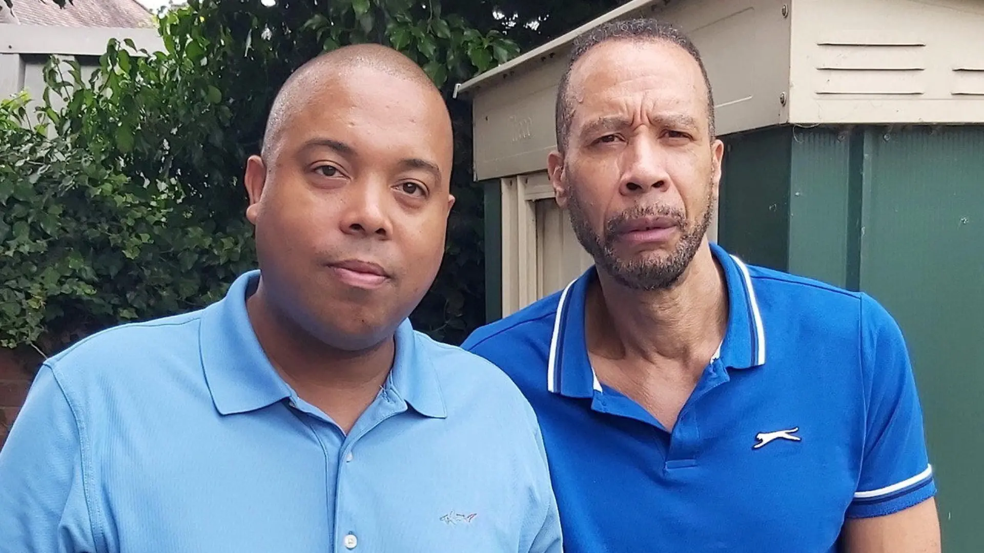 SONDERKONDITIONEN: Satzpreis!
**EMBARGO - NO ONLINE USE BEFORE 14:00BST ON 2/7/23**
Donovan Linton (left) and dad Neville Linton. Neville found the snake. See SWNS story SWSYsnake.
A grandad was given a sss-scare when he opened a bag of Aldi broccoli - and found a live SNAKE inside.Neville Linton, 63, said discovering the young ladder snake - which is capable of a nasty bite - was a "frightening" experience.He bought the broccoli from an Aldi branch in Stourbridge, West Mids, on June 2.He put it in the fridge before taking it out to prepare a meal three days later - when he spotted the snake.Neville, who works in industrial cleaning, is scared of snakes so relatives jumped to his aid and scooped the reptile up.It was later taken to nearby Dudley Zoo where it was identified as a ladder snake.The species is from south western Europe and, although not venomous, can give humans a nasty nip.Neville, a grandad-of-one from Birmingham, said: "It was pretty frightening. "I'm not good with snakes."It's lucky I didn't just leave the broccoli out in the kitchen, or it would have been loose in the house."That would have been a huge risk for us because we have two vulnerable people living here."Neville bought the broccoli as part of his regular weekly shopHe saw a little creature tucked up near the stem when he unwrapped the veg on his kitchen counter.Quickly realising it was too big to be a caterpillar, he called for his sister Ann-Marie Tenkanemin, 57, who identified it as a snake.The pair popped it in a tub and drove it back to the Aldi store in Dudley Road where Neville had bought the veg.He said: "I thought she was joking at first, but I backed off when I saw it start moving."The guy in the shop was pretty frightened too."The snake was taken to Dudley Zoo where it was identified as a young ladder snake by a specialist, said Neville's 41-year-old son Donovan.Neville has been offered compensation, but is pushing for more.The dad-of-three says the amount offered does not compensate him for the risk to his disabled son and vulnerable mother-in-law, who live with him.He added: "It's just not good enough - the implications for us if it had got out in the house are huge."Plus, I'm phobic of snakes so there's the emotional impact of that too."An Aldi spokesperson said: Our supplier has never had a complaint of this nature and has robust processes in place to prevent such issues occurring."We are investigating this isolated incident and have apologised to Mr Linton that our usual high standards were not met."Ladder snakes are mostly found in Portugal, Spain, southern France and parts of Italy.They can become aggressive when threatened and are capable of letting off a foul odour. / action press