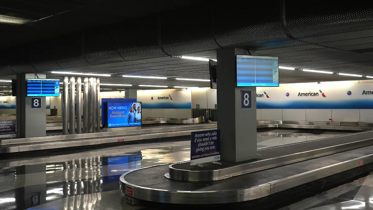 An empty American Airlines baggage carousel at O’Hare International Airport, Monday, Aug 7, 2023, in Chicago. Photo via Newscom picture alliance