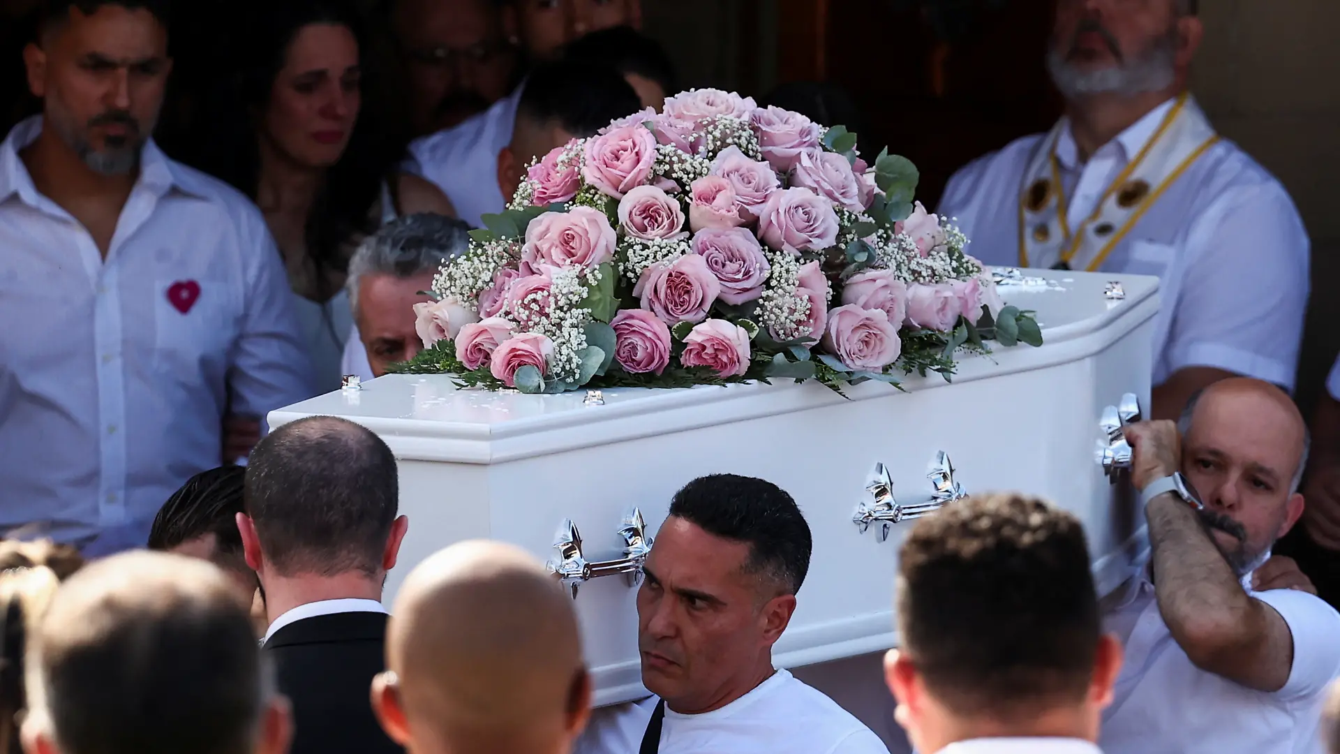 People carry the coffin of Alice Dasilva Aguiar, one of the three children who were victims of a knife attack during a dance event, at St Patrick’s Catholic Church, in Southport, Britain August 11, 2024. REUTERS/Yves Herman