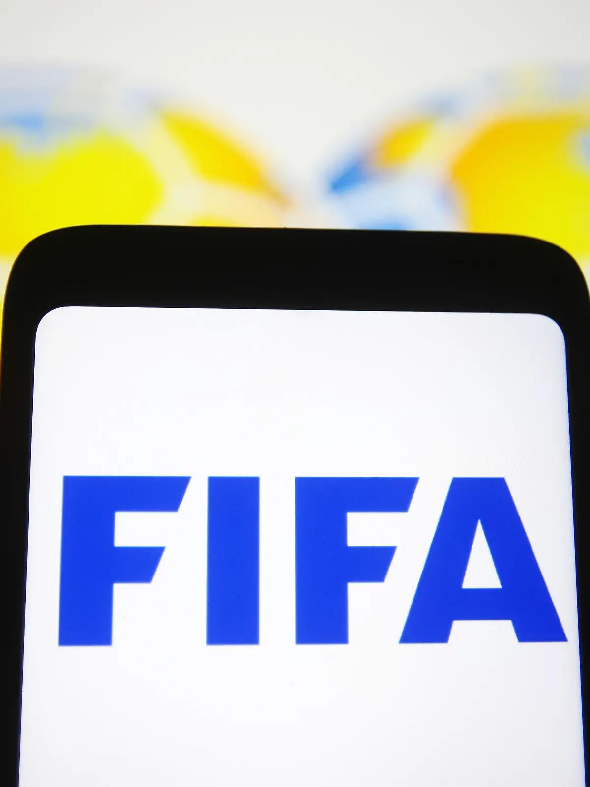 October 15, 2021, Ukraine: In this photo illustration, FIFA logo is seen on a smartphone screen. (Credit Image: © Pavlo Gonchar/SOPA Images via ZUMA Press Wire