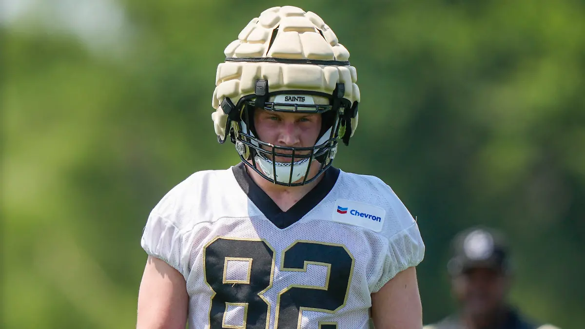 New Orleans Saints tight end Foster Moreau (82) walks between drills during NFL football practice in Metairie, La., Tuesday, May 23, 2023. (AP Photo/Gerald Herbert)