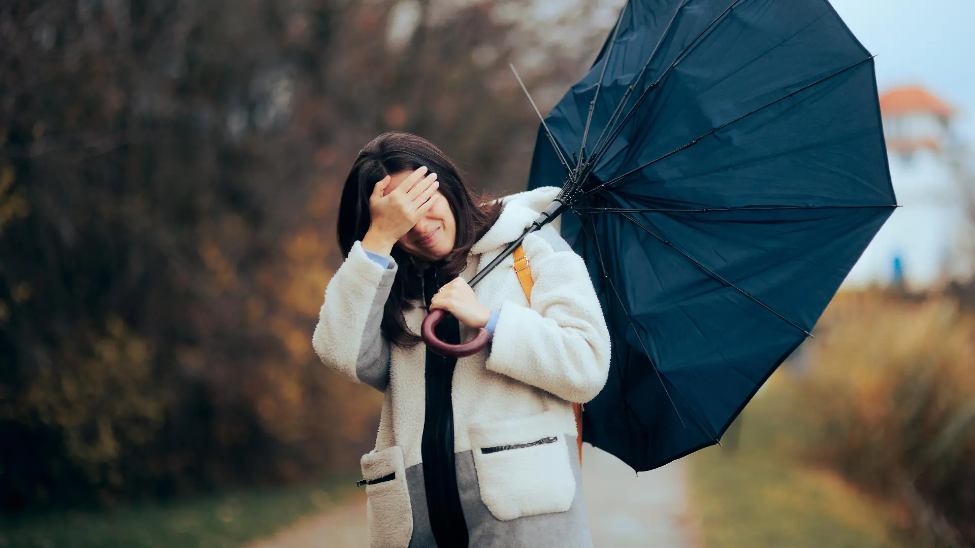 Stressed girl trying to go home during bad weather day