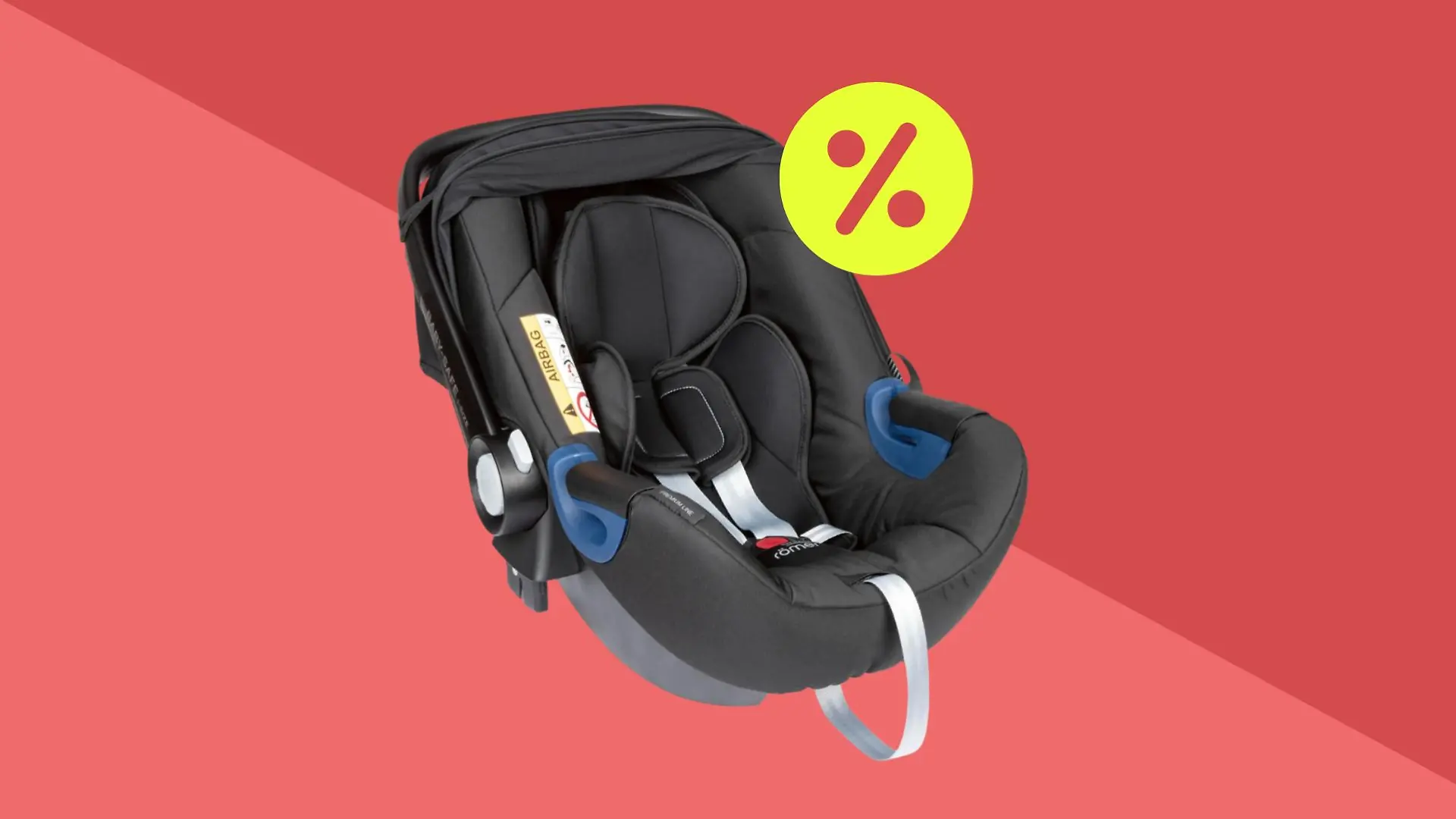 Britax-Babyschale mit Rabattzeichen vor einem roten Hintergrund.