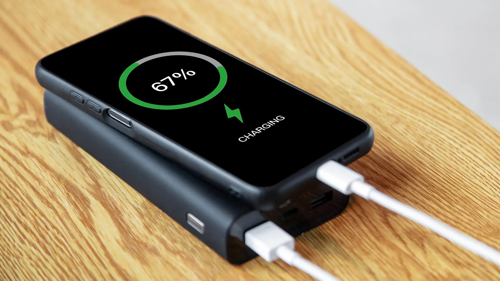 Use power bank to charge mobile phone anytime anywhere, charge sharing concept