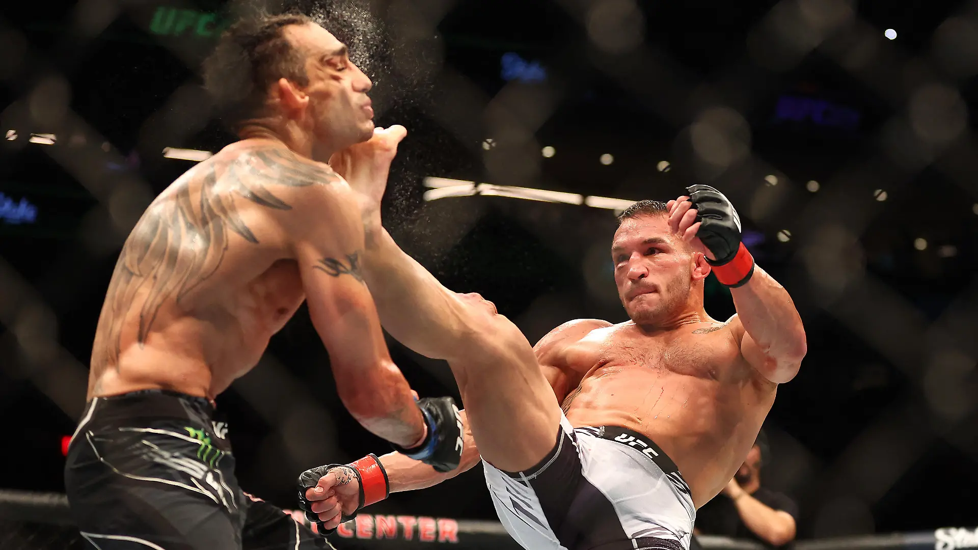 May 7, 2022; Phoenix, Arizona, USA; Michael Chandler kicks Tony Ferguson for the knockout during UFC 274 at Footprint Center. Mandatory Credit: Mark J. Rebilas-USA TODAY Sports