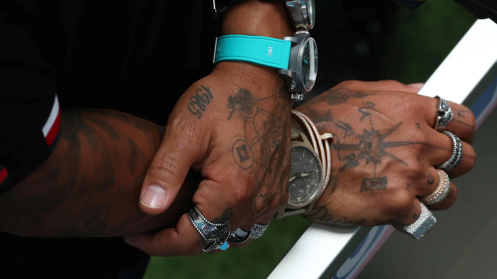 Formula 1 2022: Miami GP MIAMI INTERNATIONAL AUTODROME, UNITED STATES OF AMERICA - MAY 06: The tattoos and jewellery of Sir Lewis Hamilton, Mercedes-AMG during the Miami GP at Miami International Autodrome on Friday May 06, 2022 in Miami, United States of America. Photo by Glenn Dunbar / LAT Images Images PUBLICATIONxINxGERxSUIxAUTxHUNxONLY GP2205_104505177A5223