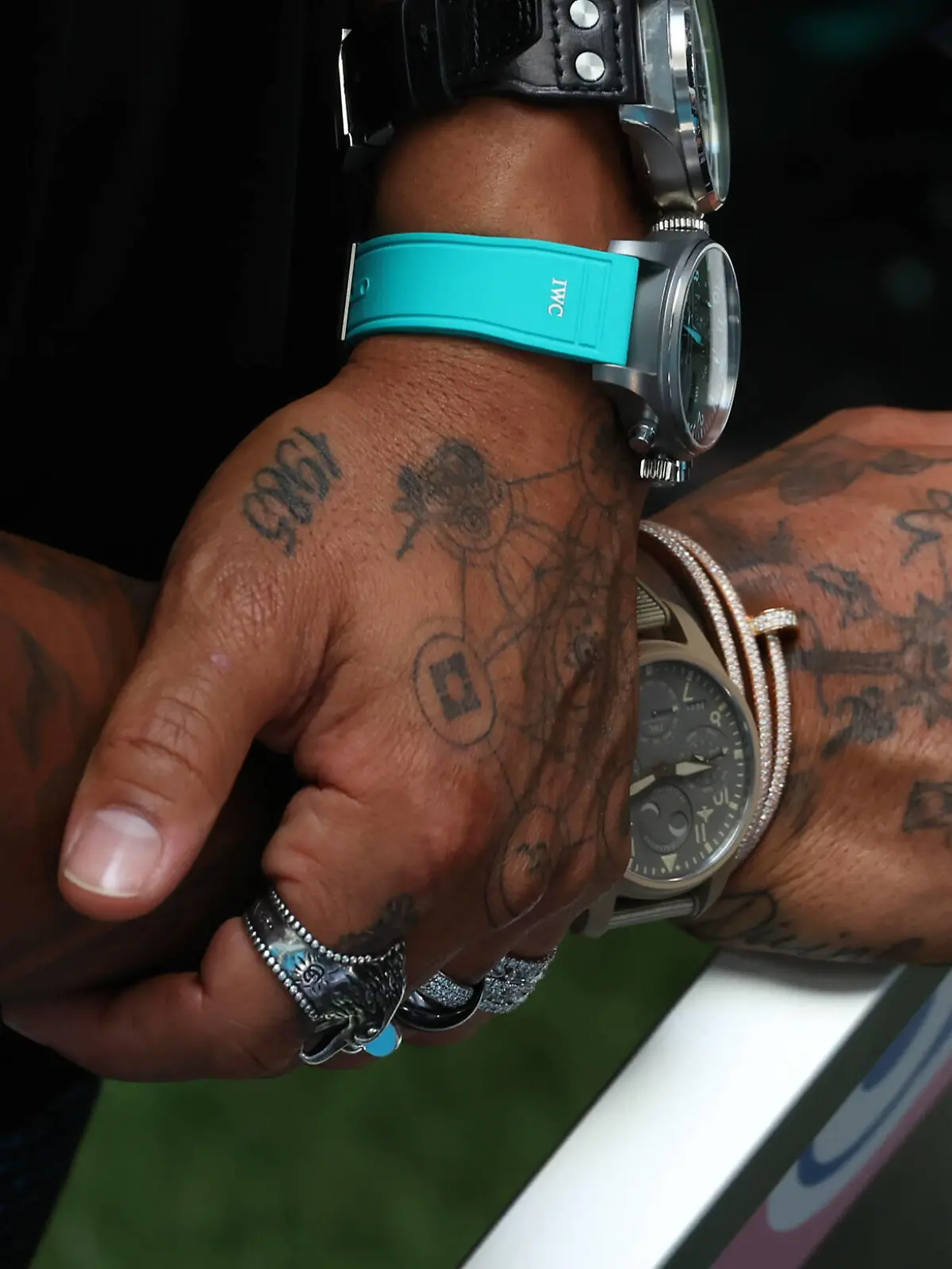  Formula 1 2022: Miami GP MIAMI INTERNATIONAL AUTODROME, UNITED STATES OF AMERICA - MAY 06: The tattoos and jewellery of Sir Lewis Hamilton, Mercedes-AMG during the Miami GP at Miami International Autodrome on Friday May 06, 2022 in Miami, United States of America. Photo by Glenn Dunbar / LAT Images Images PUBLICATIONxINxGERxSUIxAUTxHUNxONLY GP2205_104505177A5223