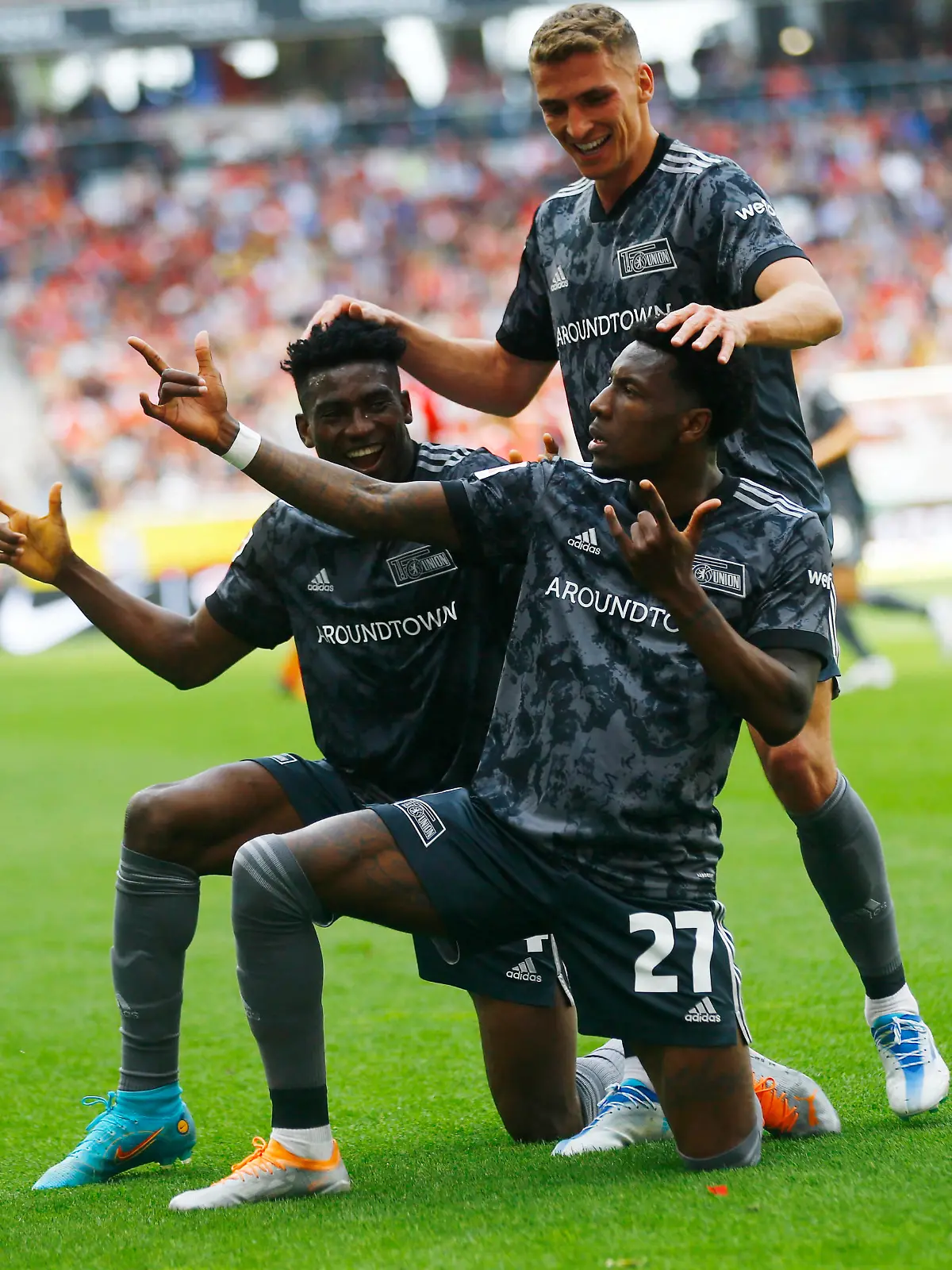 Soccer Football - Bundesliga - SC Freiburg v 1. FC Union Berlin - Europa Park Stadion, Freiburg, Germany - May 7, 2022 1. FC Union Berlin's Sheraldo Becker celebrates scoring their third goal with teammates REUTERS/Arnd Wiegmann DFL REGULATIONS PROHIBIT ANY USE OF PHOTOGRAPHS AS IMAGE SEQUENCES AND/OR QUASI-VIDEO.