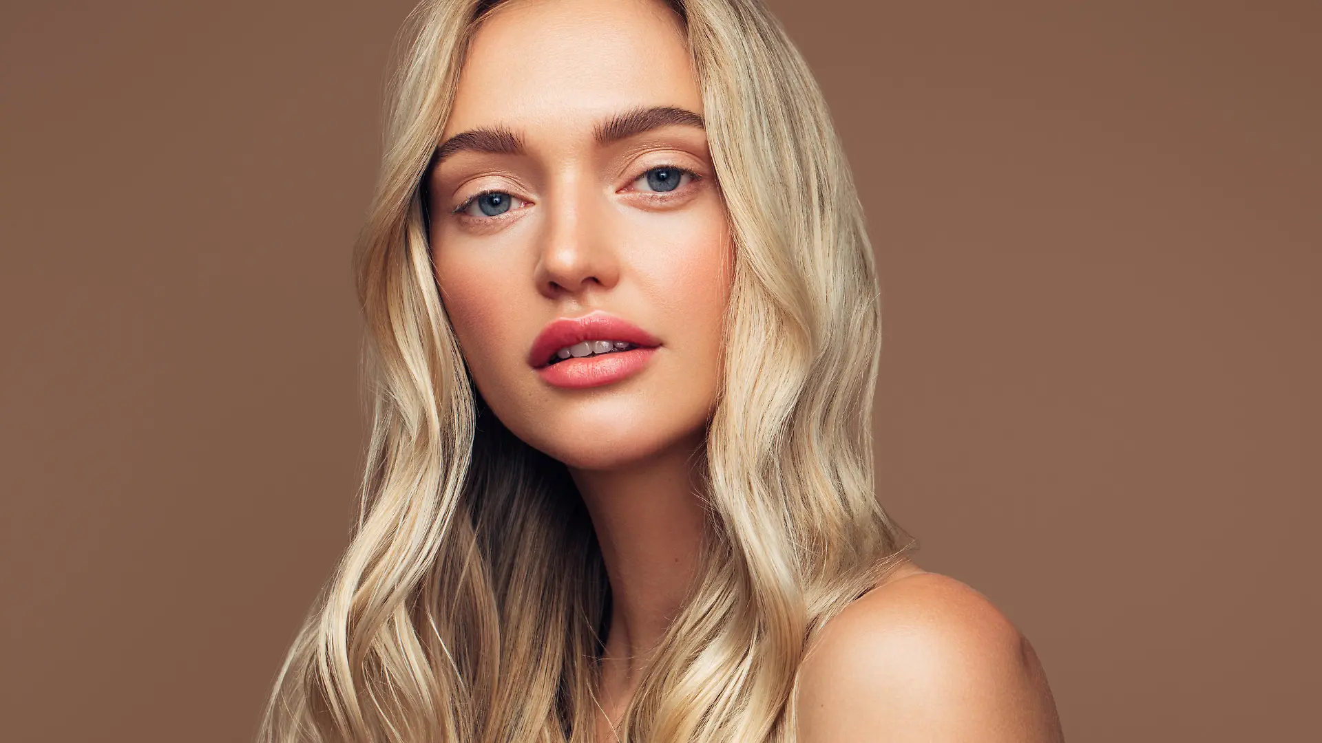 Portrait of young girl with clean skin and soft makeup