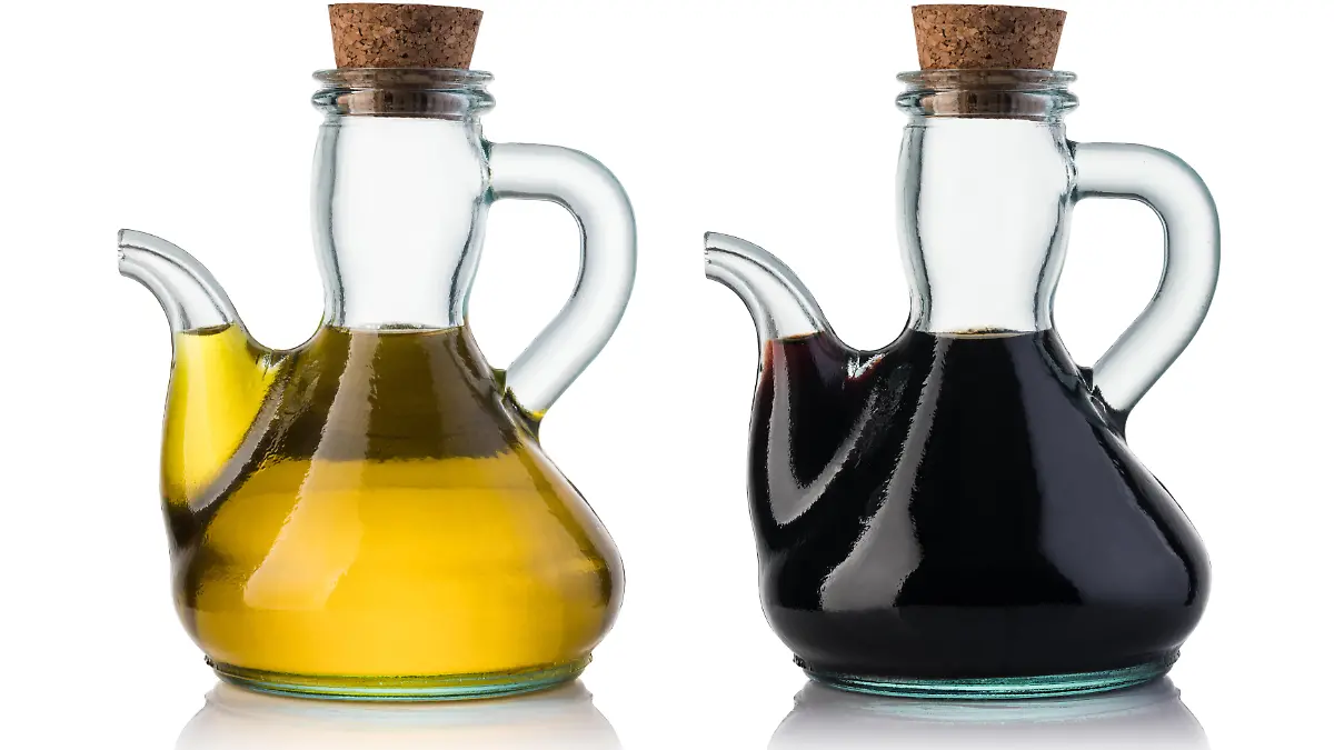 Olive oil and balsamic vinegar isolated on white background