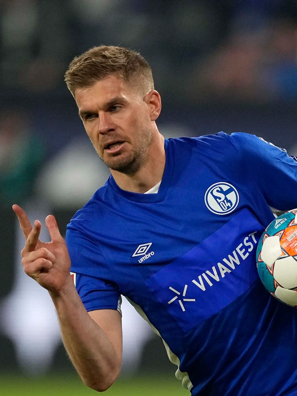 Schalke's Simon Terodde celebrates after he scored a penalty goal during the 2nd Bundesliga soccer match between FC Schalke 04 and FC St. Pauli at the Arena in Gelsenkirchen, Germany, Saturday, May 7, 2022. Traditional club FC Schalke 04 can secure an immediate return to the German top league Bundesliga with a win over St. Pauli. (AP Photo/Martin Meissner)