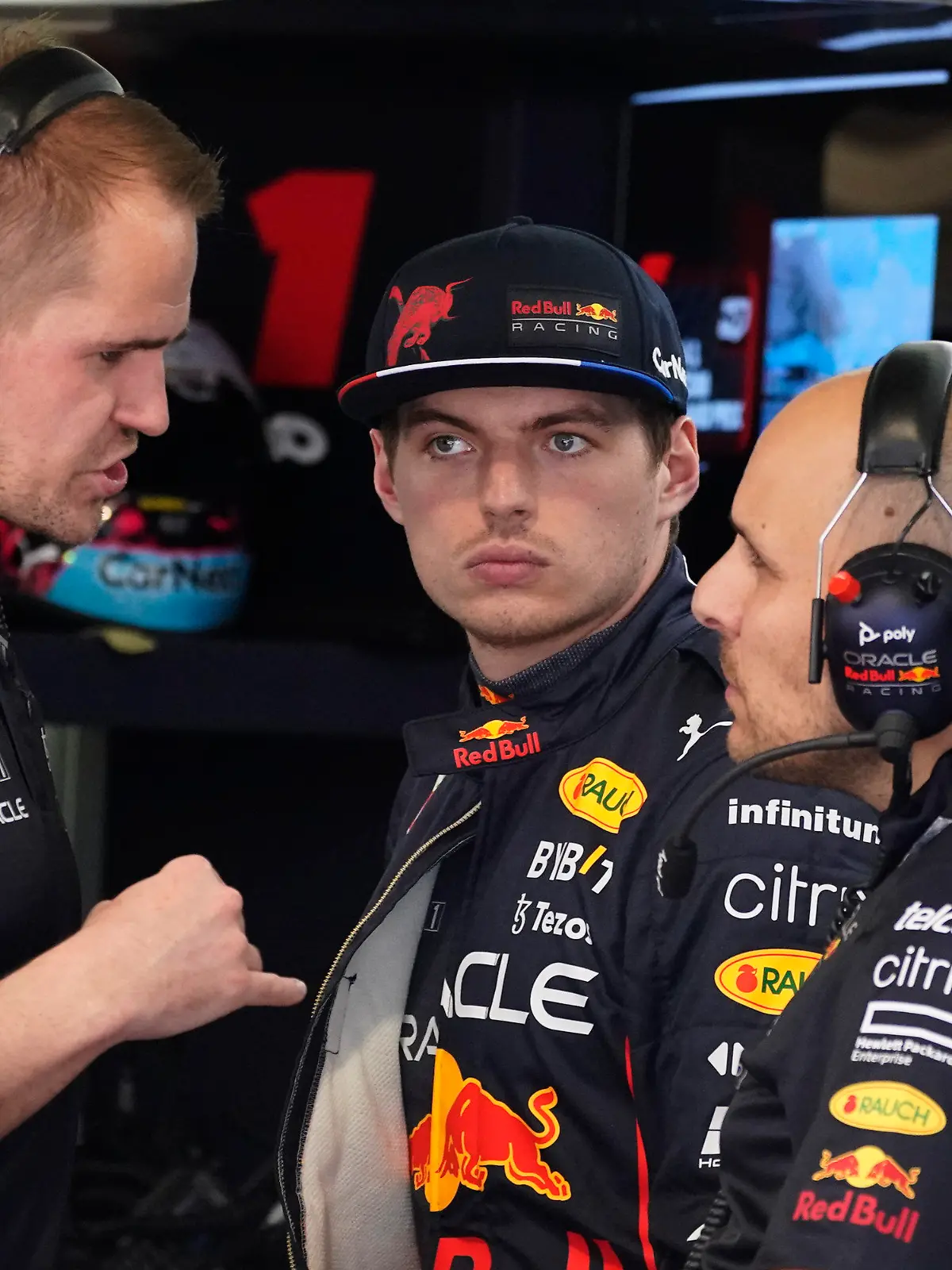 Red Bull driver Max Verstappen of the Netherlands listens to his crew before the third practice session for the Formula One Miami Grand Prix auto race at the Miami International Autodrome, Saturday, May 7, 2022, in Miami Gardens, Fla. (AP Photo/Darron Cummings)