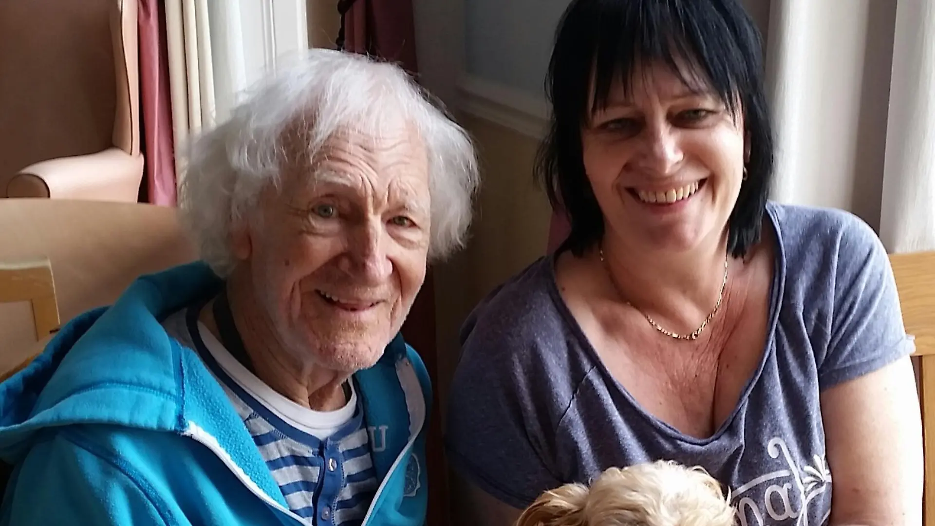 Story from Jam Press (Secret Bondage Room)
Pictured: Caroline Humphries with late father John.
Woman living in UK's most haunted house finds hidden BONDAGE ROOM and diaries revealing family secret
A woman has revealed how she found out her late dad was gay after discovering his secret diaries and 'bondage room' hidden inside her home – and says she's "quite proud" of his extracurricular activities.
Caroline Humphries, 60, is the owner of the 1000-year-old Ancient Ram Inn, a Grade-II listed building in Gloucestershire dubbed the "most haunted house in the UK".
It previously belonged to her late father John Humphries, who bought the inn in 1968 but sadly passed away in 2017.
After his death, Caroline discovered a bondage-type room, home-made sex toys and his journals, which he wrote daily from 1972, revealing he was gay but that he had kept it a secret from most people throughout his life.
“We knew there was a space above the kitchen where dad used to disappear to," Caroline told Jam Press.
"It was full of rats so after he died I went in there to see what was in it.
“There was a big mirror hanging above a bed with great big thick ropes, handmade dildos on the beams, leather and bondage gear and the inner tube of a rubber tyre with a nose and mouth space cut into it.
“I thought it was hilarious.”
Investigating further, Caroline – who up until this point had no idea her dad was gay – found his secret diaries and decided to read them to get to know him better.
She said: “When I read his diaries I found out he was gay.
"He had written that he moved the family’s lodger Pete* into the inn because he couldn't give mum the proper sexual relationship that a married couple would have.
"So he allowed Pete to move in for him and mum to sleep together."
She also found photos of her dad wearing rubber gear while "sitting on mum's sewing machine".
Although she feels sad that her dad never found love with a man while alive, Caroline is thrilled to