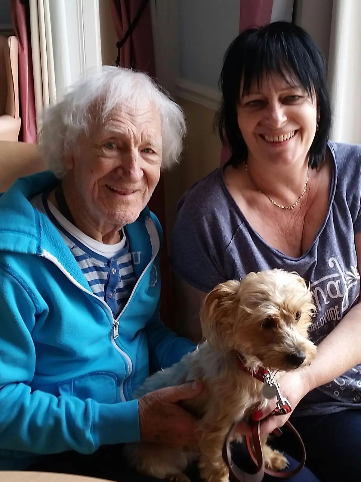 Story from Jam Press (Secret Bondage Room)

Pictured: Caroline Humphries with late father John.

Woman living in UK's most haunted house finds hidden BONDAGE ROOM and diaries revealing family secret

A woman has revealed how she found out her late dad was gay after discovering his secret diaries and 'bondage room' hidden inside her home – and says she's "quite proud" of his extracurricular activities.

Caroline Humphries, 60, is the owner of the 1000-year-old Ancient Ram Inn, a Grade-II listed building in Gloucestershire dubbed the "most haunted house in the UK".

It previously belonged to her late father John Humphries, who bought the inn in 1968 but sadly passed away in 2017.

After his death, Caroline discovered a bondage-type room, home-made sex toys and his journals, which he wrote daily from 1972, revealing he was gay but that he had kept it a secret from most people throughout his life.

“We knew there was a space above the kitchen where dad used to disappear to," Caroline told Jam Press.

"It was full of rats so after he died I went in there to see what was in it.

“There was a big mirror hanging above a bed with great big thick ropes, handmade dildos on the beams, leather and bondage gear and the inner tube of a rubber tyre with a nose and mouth space cut into it. 

“I thought it was hilarious.”

Investigating further, Caroline – who up until this point had no idea her dad was gay – found his secret diaries and decided to read them to get to know him better.

She said: “When I read his diaries I found out he was gay. 

"He had written that he moved the family’s lodger Pete* into the inn because he couldn't give mum the proper sexual relationship that a married couple would have.

"So he allowed Pete to move in for him and mum to sleep together."

She also found photos of her dad wearing rubber gear while "sitting on mum's sewing machine". 

Although she feels sad that her dad never found love with a man while alive, Caroline is thrilled to